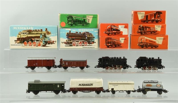 LOT OF 8: ASSORTED MARKLIN TRAINS IN BOXES.       