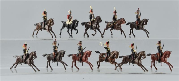 LOT OF 11: BRITAINS MOUNTED SOLDIERS.             