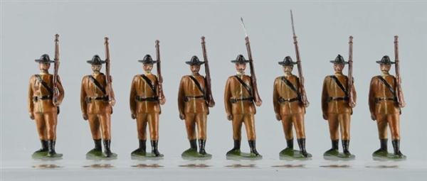 EARLY TOY SOLDIERS IN KHAKI ON ROUND BASES.       