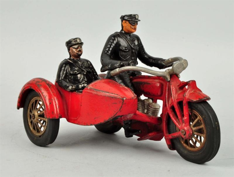 CAST IRON POLICE MOTORCYCLE,SIDECAR & PASSENGER.  
