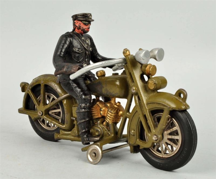 GREEN CAST IRON MOTORCYCLE WITH DRIVER.           