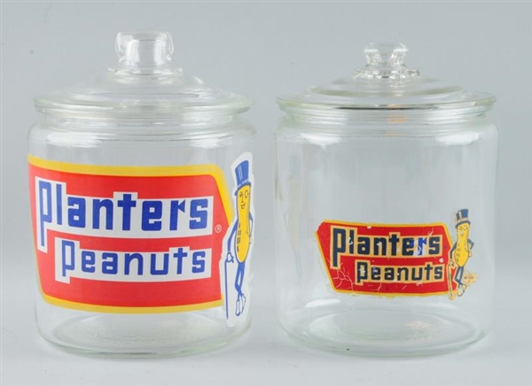 LOT OF 2: PLANTERS PEANUTS ADVERTISING GLASS JARS.