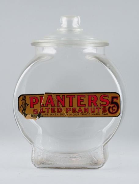PLANTERS PEANUTS GLASS JAR.                       