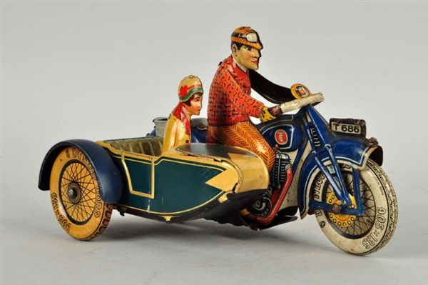 GERMAN TIN LITHO TIPPCO MOTORCYCLE WITH SIDE CAR. 