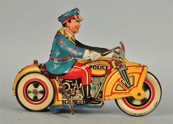 UNIQUE ART TIN LITHO WIND UP POLICE MOTORCYCLIST. 