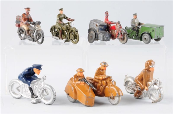 LOT OF 7:  CAST IRON MOTORCYCLE TOYS.             