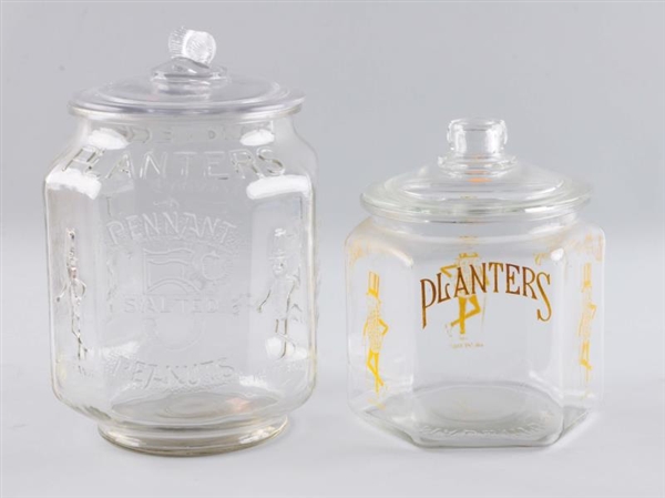 LOT OF 2: PLANTERS PEANUT GLASS JARS.             