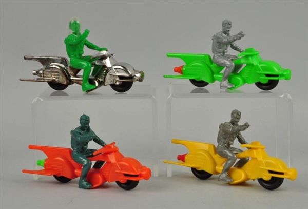 LOT OF 4: PLASTIC ARCHER SPACE CYCLE TOYS.        