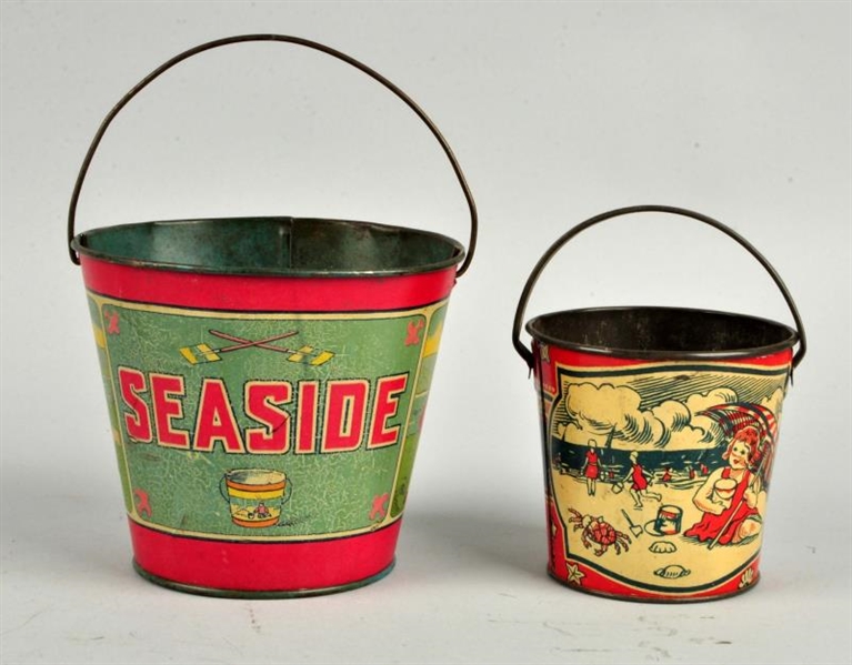 LOT OF 2: EARLY BEACH THEMED SAND PAILS.          