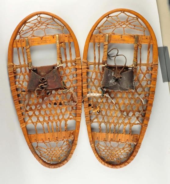 PAIR OF EARLY WOODEN SNOW SHOES.                  