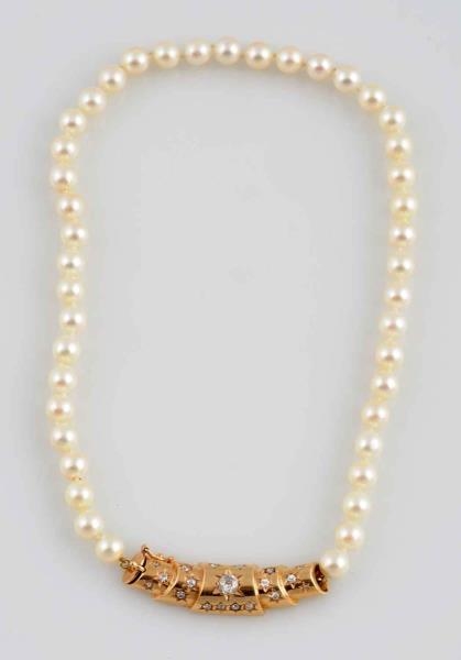 1.25 CT. DIAMOND & 14K GOLD PEARL NECKLACE.       