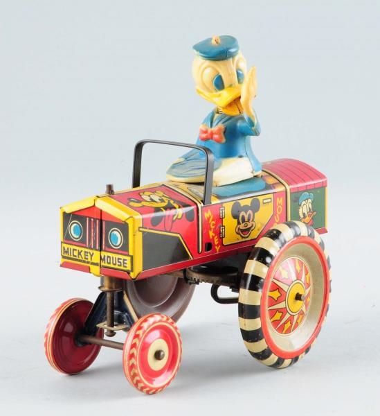 MARX TIN LITHO DISNEY DONALD DUCK CAR TOY.        