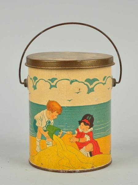 TIN LITHO CAN WITH CHILDREN AT THE SEASHORE.      
