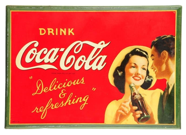 1941 COCA - COLA TIN SIGN WITH COUPLE.            