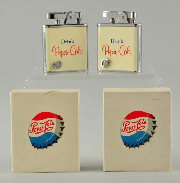 LOT OF 2: BOXED PEPSI - COLA MUSICAL LIGHTERS.    