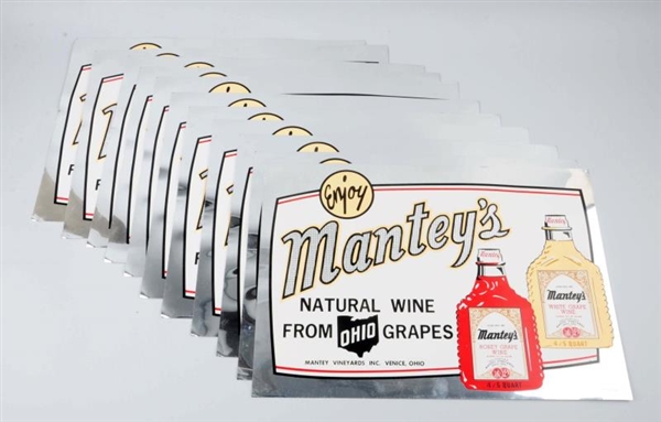 LOT OF 11: 1950S - 60S MANTEYS WINE SIGNS.     