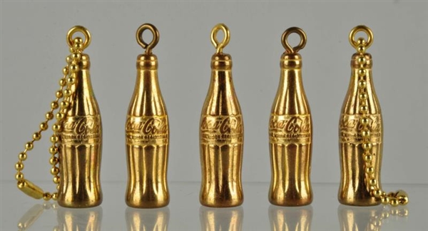 APPROX. 50: 1950S COCA - COLA KEY CHAINS.        