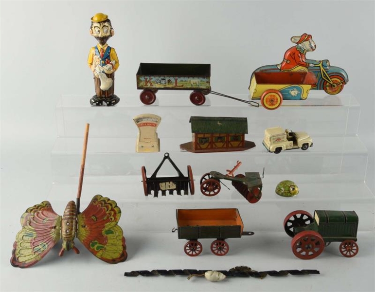 LARGE LOT OF ASSORTED TIN TOYS.                   