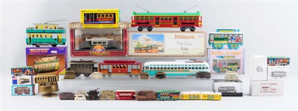 LOT OF ASSORTED COLLECTABLE TROLLEY RELATED ITEMS.