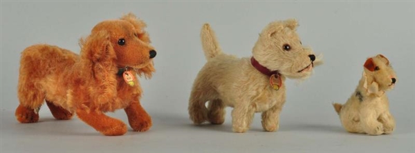 THREE VERY COLLECTIBLE EARLY POST WAR STEIFF DOGS.