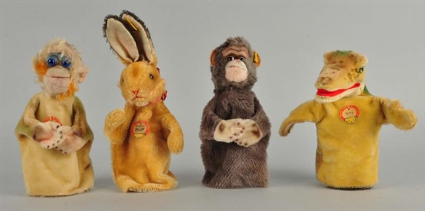 FOUR STEIFF PUPPETS WITH IDS.                     