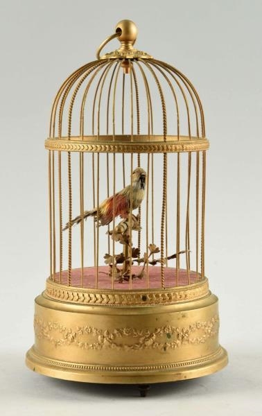 FRENCH SINGING BIRD IN CAGE.                      