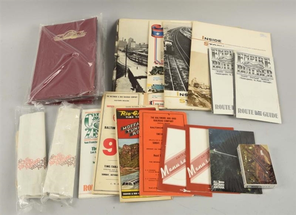 LARGE LOT OF ASSORTED TRAIN ADVERTISEMENTS.       