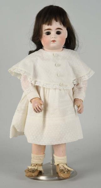 ANTIQUE BISQUE HEADED DOLL.                       