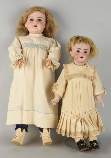 LOT OF 2: ANTIQUE FRENCH BISQUE HEAD DOLLS.       