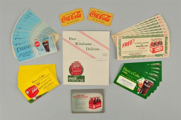 LOT OF APPROX. 50: COCA - COLA FREE DRINK COUPONS.