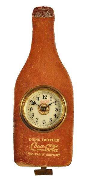 CA. 1905 COCA - COLA LEATHER BOTTLE CLOCK.        