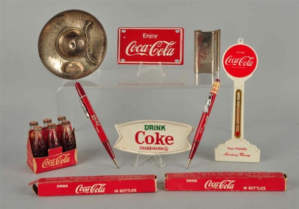 LOT OF 8: ASSORTED SMALL COCA - COLA ITEMS.       