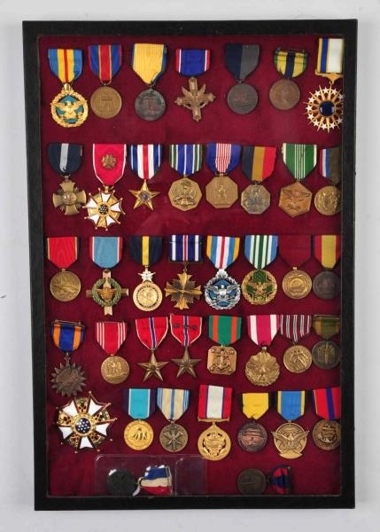 LOT OF 40: U.S. MILITARY MEDALS AND RIBBONS.      