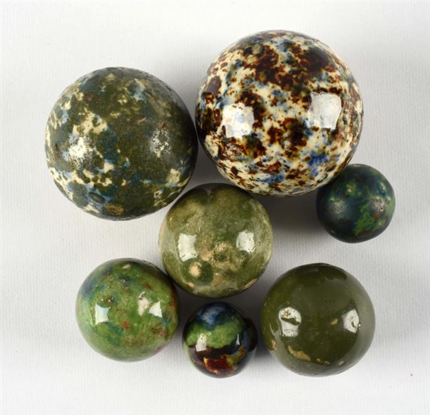 LOT OF 7: HARD TO FIND BENNINGTON STYLE MARBLES.  