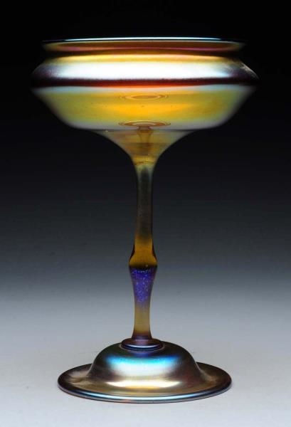 SIGNED TIFFANY ART GLASS BOWL ON A TALL PEDESTAL. 