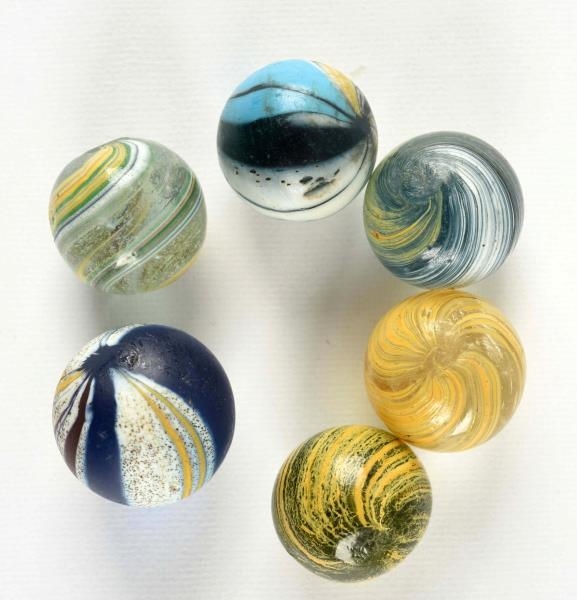 LOT OF 6: BANDED TRANSPARENT SWIRL MARBLES.       