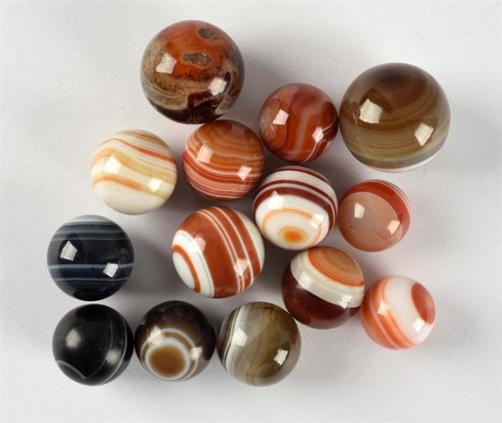 LOT OF 14: HAND FACETED AGATE MARBLES.            