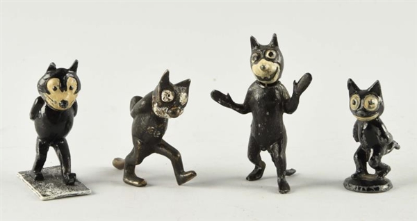 LOT OF 4:CAST IRON FELIX THE CAT PAPERWEIGHT TOYS.