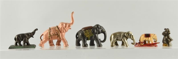 LOT OF 5: CAST IRON ELEPHANT PAPERWEIGHTS.        