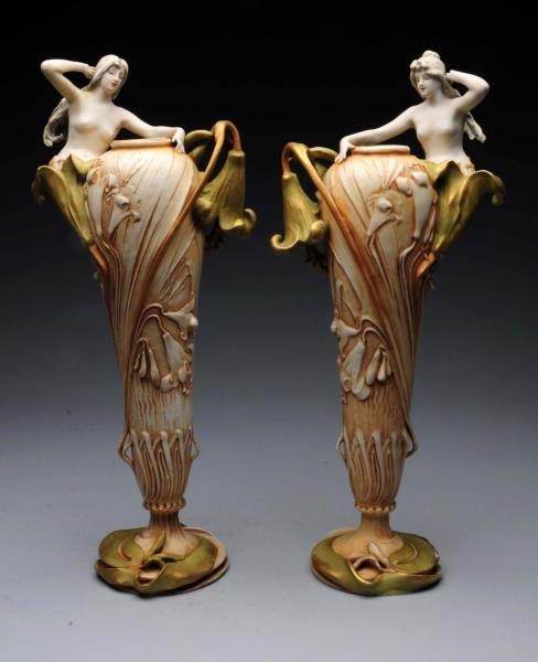 A TALL OPPOSING PAIR OF AMPHORA ART NOUVEAU VASES.