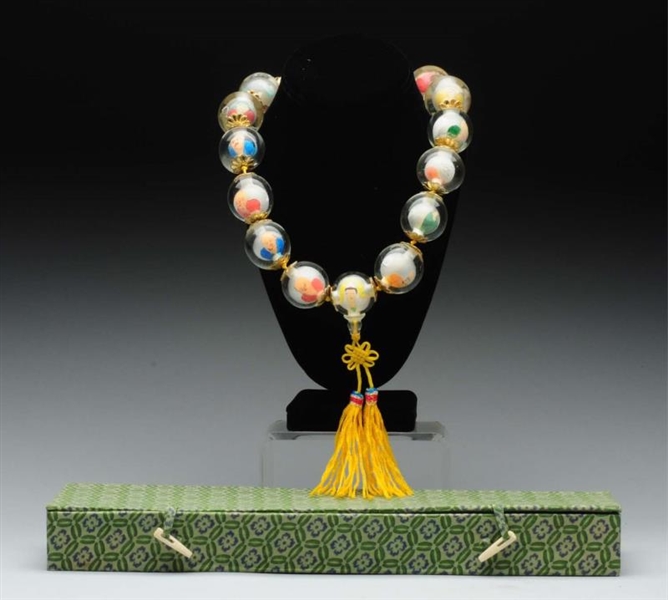 CHINESE REVERSE PAINTED GLASS BEAD NECKLACE.      