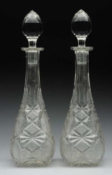 LOT OF 2: GLASS STOPPERED  DECANTERS.             
