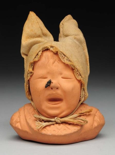 FRENCH POTTERY BABIES HEAD WITH CRYING BABY.      