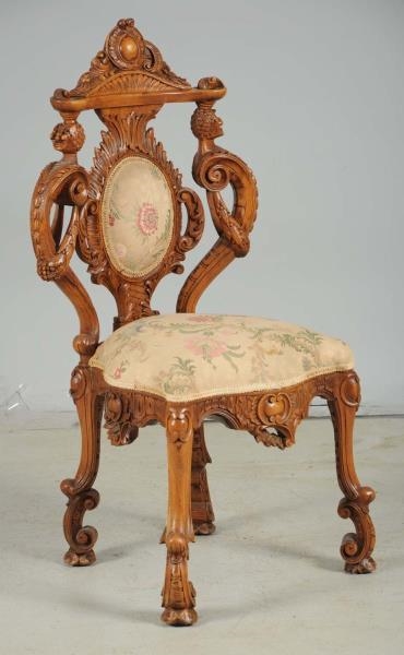 HAND CARVED WOODEN PARLOR CHAIR.                  