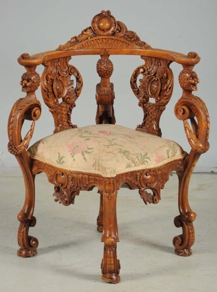 HAND CARVED WOODEN CORNER CHAIR.                  