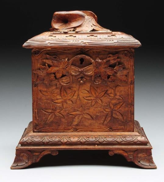WOODEN CARVED BOX WITH LEAFS CARVED ON BOX.       