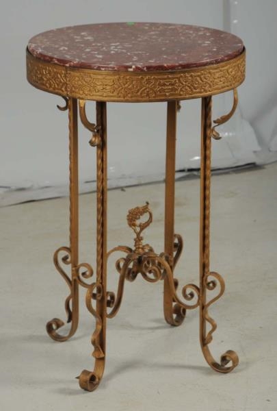 SMALL METAL TABLE WITH MARBLE TOP.                