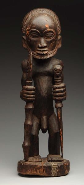 AFRICAN CARVED FIGURE OF WARRIOR.                 