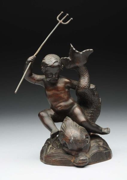 VINTAGE BRONZE STATUE OF BOY RIDING DOLPHIN.      