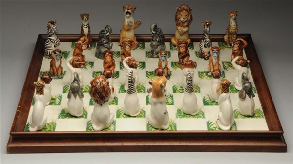LOT OF 32: UNUSUAL HAND PAINTED CHESS SET.        